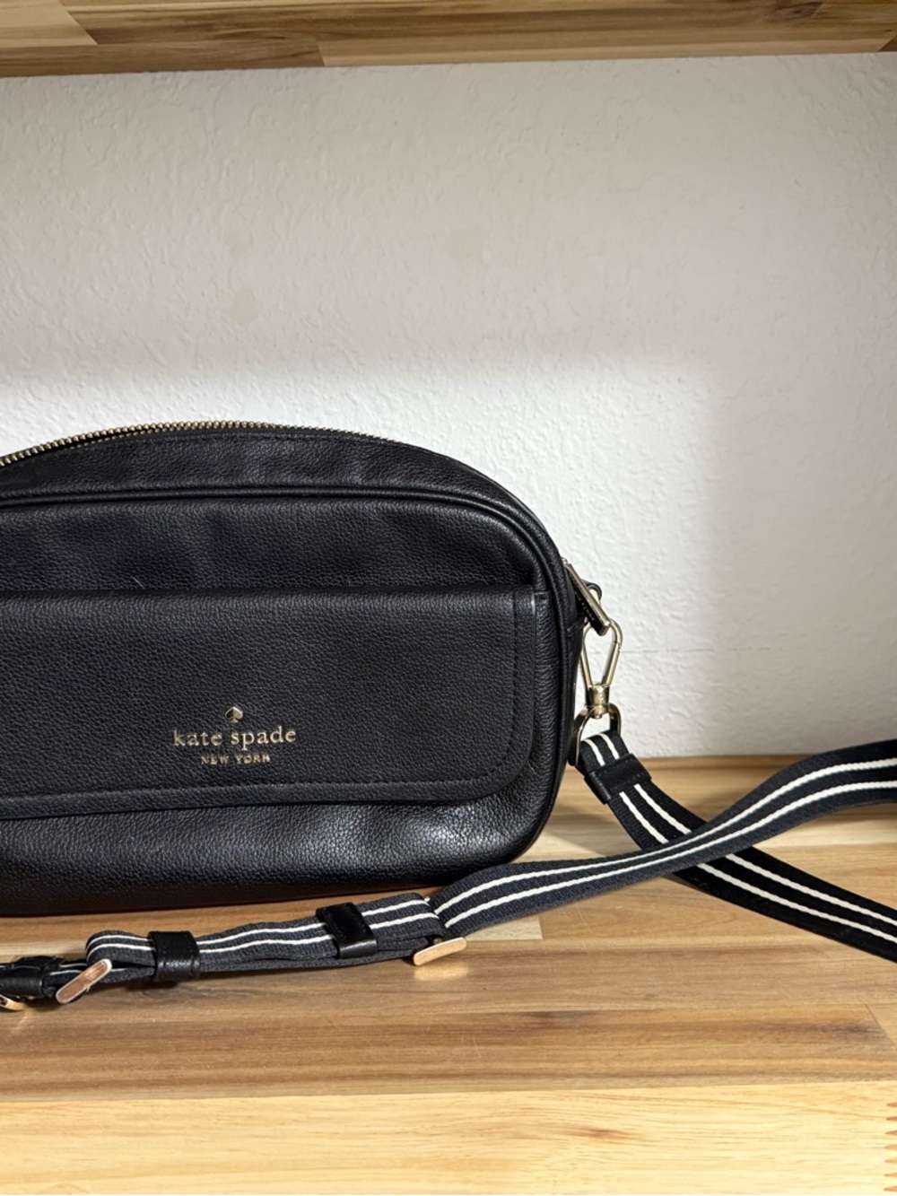 kate spade black leather crossbody with striped strap